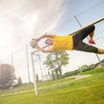 Préparation physique pour footballeurs amateurs Goal effectuant un arrêt